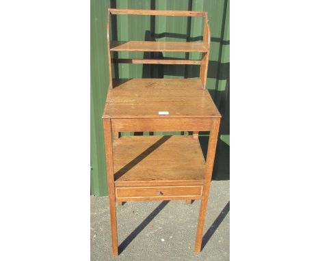 20th century oak three-tier bedside table, with shelf and drawer on square supports, W47cm D39cm H114cmShipping POA  https://