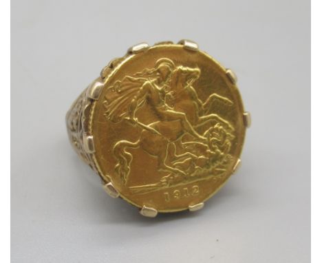 Geo.V 1912 half sovereign in 9ct gold ring mount, stamped 9ct, 8.66gShipping £20.00 plus vat (UK Only)