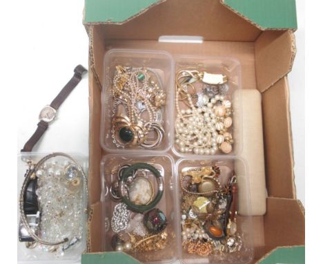 Collection of modern and vintage costume jewellery including faux pearls, brooches, carved stone hinged bangle etc.Shipping £
