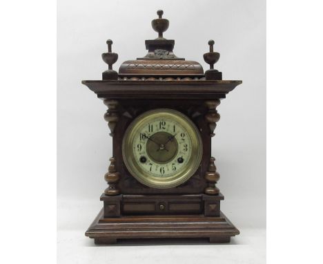 Badische Black Forest mantle clock, carved case with applied mouldings and finials, 3 3/4" dial with Arabic chapter ring, sig