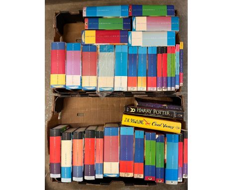 Large collection of Harry Potter books including first editions in hardcover and softcover (2 boxes, qty)Shipping £58.00 plus