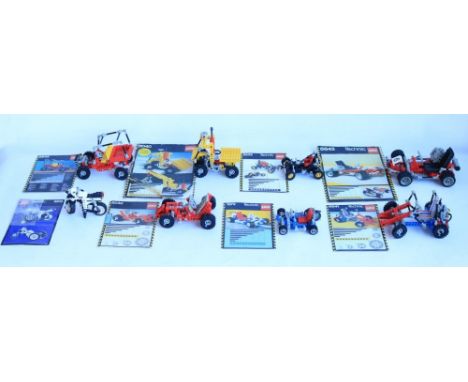 Eight Lego Technic model sets Circa early 1980's-early 1990's, all complete and with original instruction manuals, sets inclu