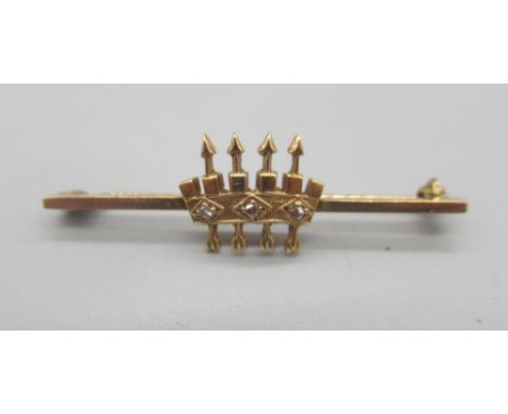 9ct yellow gold Polaris Missile Crew tie pin set with diamonds, stamped 375, 2.26gShipping £23.00 plus vat (UK Only)