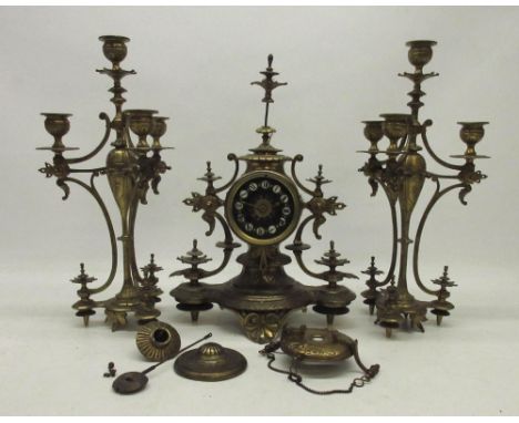 H. Marc Paris, 19th Century French three piece gilt brass clock garniture, 3" dial with inset enamel Roman cartouche indices,