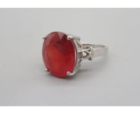 18ct white gold cocktail ring set with large red sapphire, stamped 750, size N, 6.77gShipping £20.00 plus vat (UK Only)