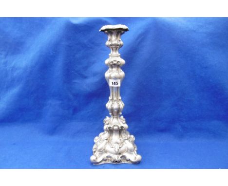 A TALL ROCOCO STYLE WHITE METAL CONTINENTAL CANDLE STICK MARKED 925, A/F