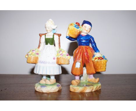 2 Royal Worcester figures of  a Dutch boy and girl