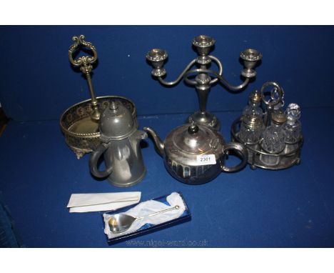 A quantity of silver plate including five piece cruet set, candelabra, Teapot, ''Manor Pewter'' coffee pot, pewter spoon, etc