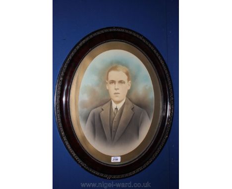 An oval framed Portrait of a Young Gentleman.