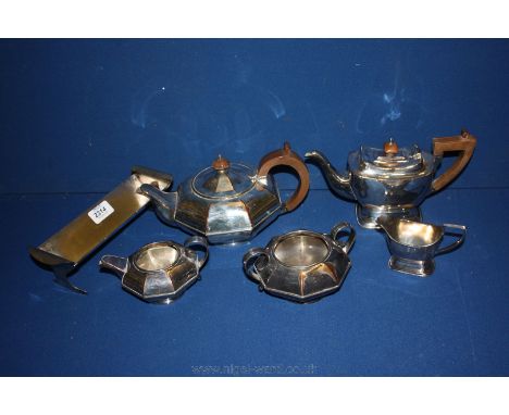 A quantity of silver plate including Teapots with wooden handle and finial, sugar bowl, milk jug and trough.