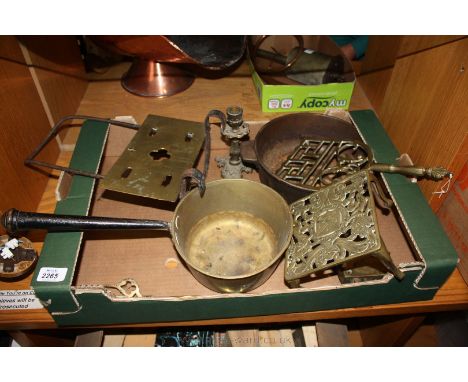 A quantity of Brass including trivets, toasting fork, saucepans, old lock, etc.