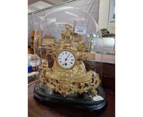 19th century gilt spelter French figural single train mantel clock, on ebonised base with glass dome. Overall 41cm high appro