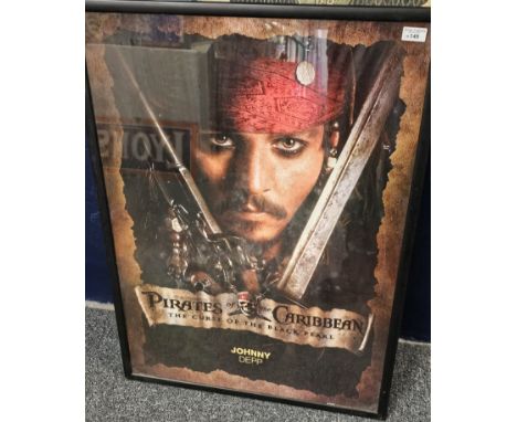 Pirates of the Caribbean 'The Curse of the Black Pearl' colour printed cinema poster. 90x64cm approx. Framed and glazed.  (B.