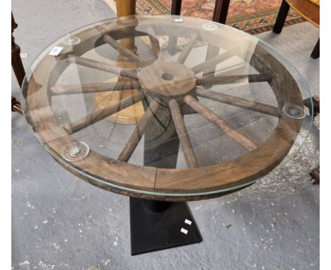 Small cartwheel style circular pedestal occasional table. 63cm diameter approx. (B.P. 21% + VAT)