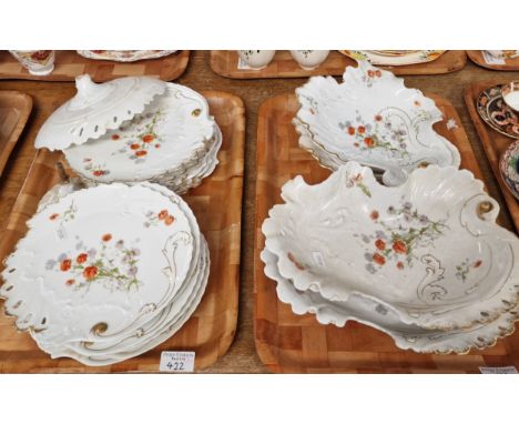 Two trays French Limoges porcelain dessert service items to include: leaf shaped dishes and various plates, overall decorated