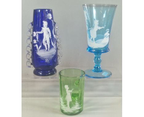 Collection of Mary Gregory style coloured glass to include: green single handled mug/beaker, blue ground goblet and an ovoid 