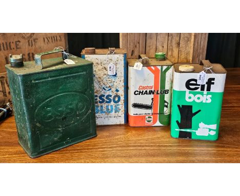 An Esso two-gallon petrol can with original brass cap together with three one gallon metal oil cans; Elf, Esso and Castrol. (