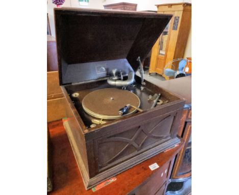 HMV oak cased table top wind-up gramophone. 44cm wide approx.  (B.P. 21% + VAT)