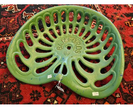 A Bamford's  (Uttoxeter)  cast metal vintage style tractor seat. (B.P. 21% + VAT)
