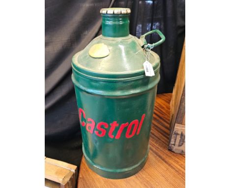 A Castrol cylindrical metal oil drum with loop handle and appearing original printed cap. (B.P. 21% + VAT) Good condition, ob