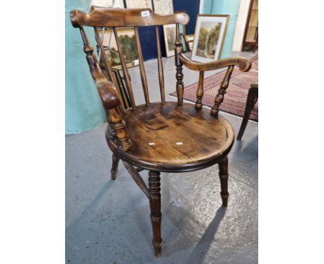 Early 20th century stained beech stick backed circular seated elbow chair. (B.P. 21% + VAT)