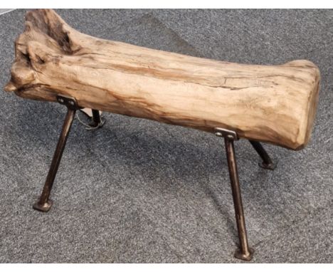 Blacksmith Salvage, Welsh bench, the seat made from a tree trunk, standing on tubular steel legs. 74cm long approx. (B.P. 21%