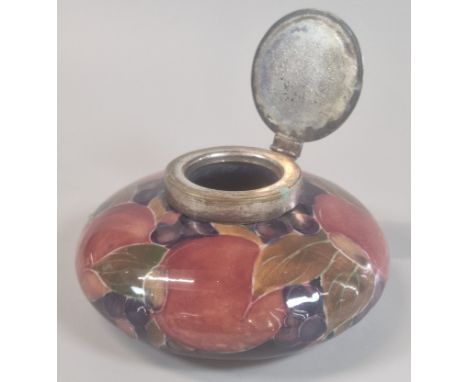 Moorcroft Pottery 'Pomegranate' design tube-lined inkwell, of squat form. Signed and impressed marks to the underside. With p