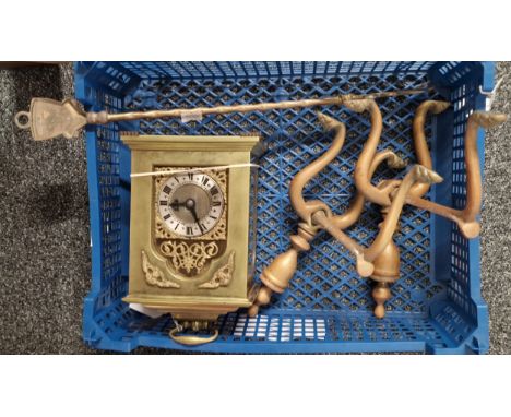Pair of brass fire dogs, together with brass toasting fork and brass bracket clock with key.  (B.P. 21% + VAT)