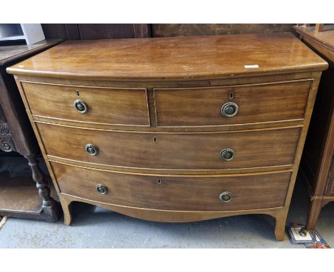 Edward mahogany bow fronted low chest of two short and two long cock beaded and graduated drawers. 102cm wide approx.  (B.P. 
