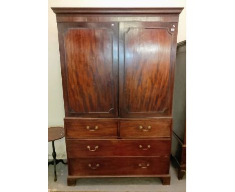 Georgian mahogany two stage hanging cupboard, with two blind short cock beaded drawers above two cock beaded drawers below on