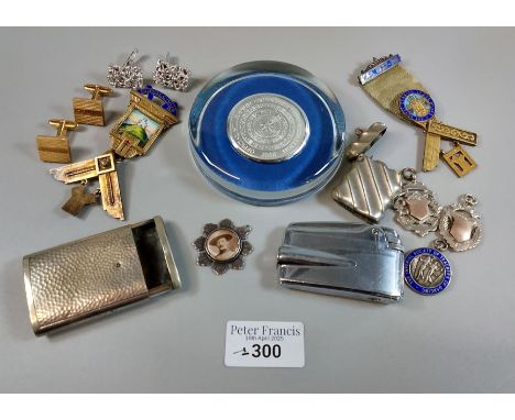 Plastic tub of oddments to include; vintage lighter, silver and enamel Masonic jewels, silver fobs, cufflinks, Greenwich Mill