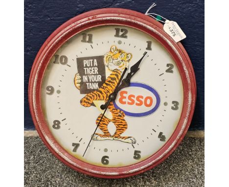 Esso 'Put a Tiger in your Tank' metal framed advertising clock, with quartz movement and sweep seconds hand. 28cm diameter ap