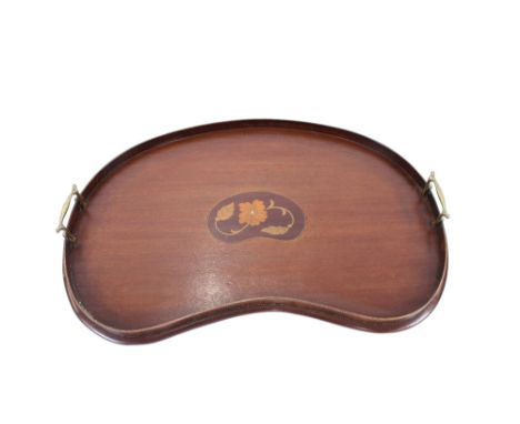 An Edwardian mahogany and satinwood cross-banded oval tea tray, having central conch shell paterae, flanked by brass carrying