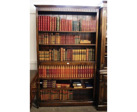 A good quality reproduction oak open fronted bookcase, with central solid shelf and adjustable shelves, 128cm wide x 205cm hi