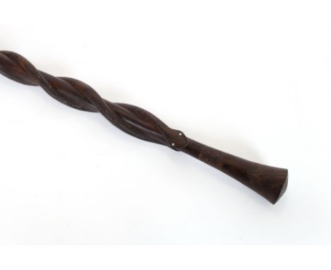 An African carved hardwood walking stick, entwined with snakes, 104cm long