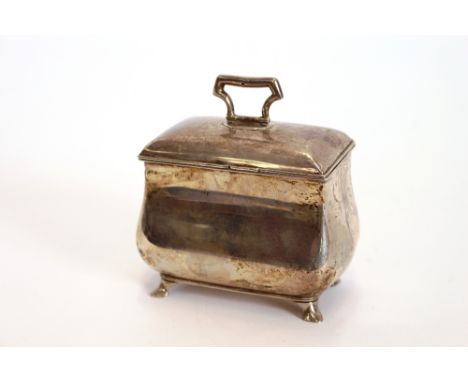 A silver bombe shape caddy box, by S.W. Smith & Co., having domed lid, raised on four hoof shaped feet, Birmingham 1918, 9cm,