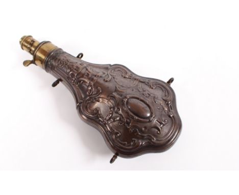 A Hawksley copper powder flask, of large size, profusely decorated with foliate scrolls and vacant cartouche, 25.5cm