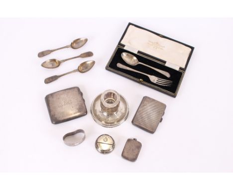 An Edwardian silver vesta case, Birmingham 1906; two silver cigarette cases; a silver Christening fork and spoon; and various