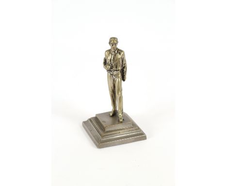 An early 20th Century signed photograph of F R Spofforth; together with a cast metal figure of the cricketer, 15cm high 