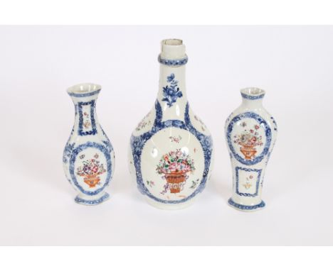 Two late 18th Century Chinese porcelain vases, having lobed necks to the oval pear shaped bodies, decorated famille rose and 