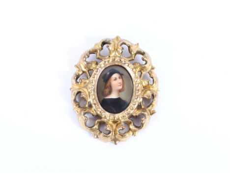 A 19th Century Italian portrait on oval porcelain panel, of a young gentleman in carved giltwood Florentine frame