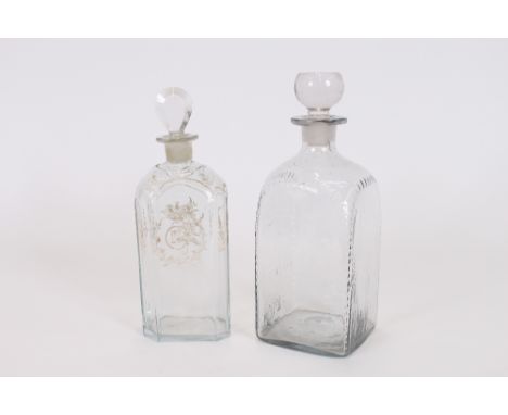 A Georgian glass decanter, having gilt decoration and tear drop shaped stopper, three square section decanters with hob-nail 