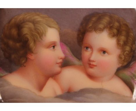 A finely painted oblong porcelain plaque, depicting two cherubs; another smaller example depicting a queen; a small oval plaq