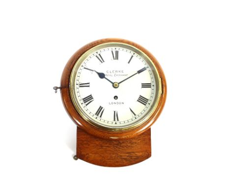 A Victorian oak cased time piece, of small proportions, by Clerke, Royal Exchange, London, the 8in enamel Roman numeral dial 