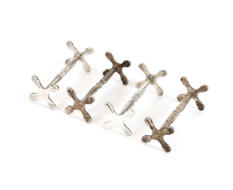 A set of four Victorian silver knife rests, London 1850