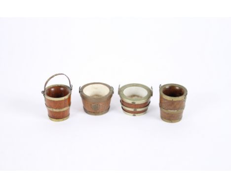 A late Victorian miniature walnut drip bucket, with brass bands and loop handles, 5cm dia.; another (lacking handle); and two