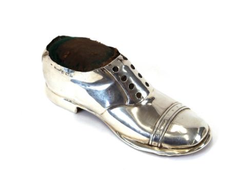 An Edwardian silver novelty pin cushion, in the form of a shoe by S Blanckensee & Sons, Birmingham 1909