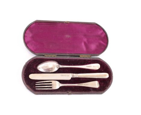 A Victorian silver three piece Christening set, comprising fork, spoon and knife, cased, London 1875