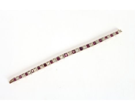 A pink sapphire and silver bracelet, cased
