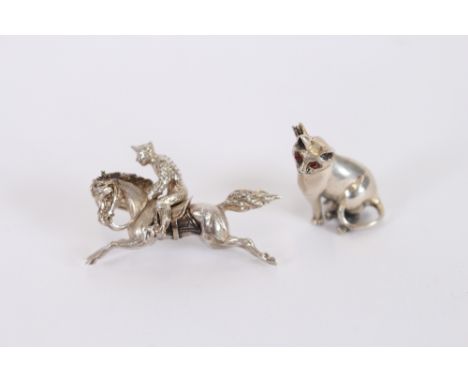 A silver cat brooch; and another of a horse and jockey
